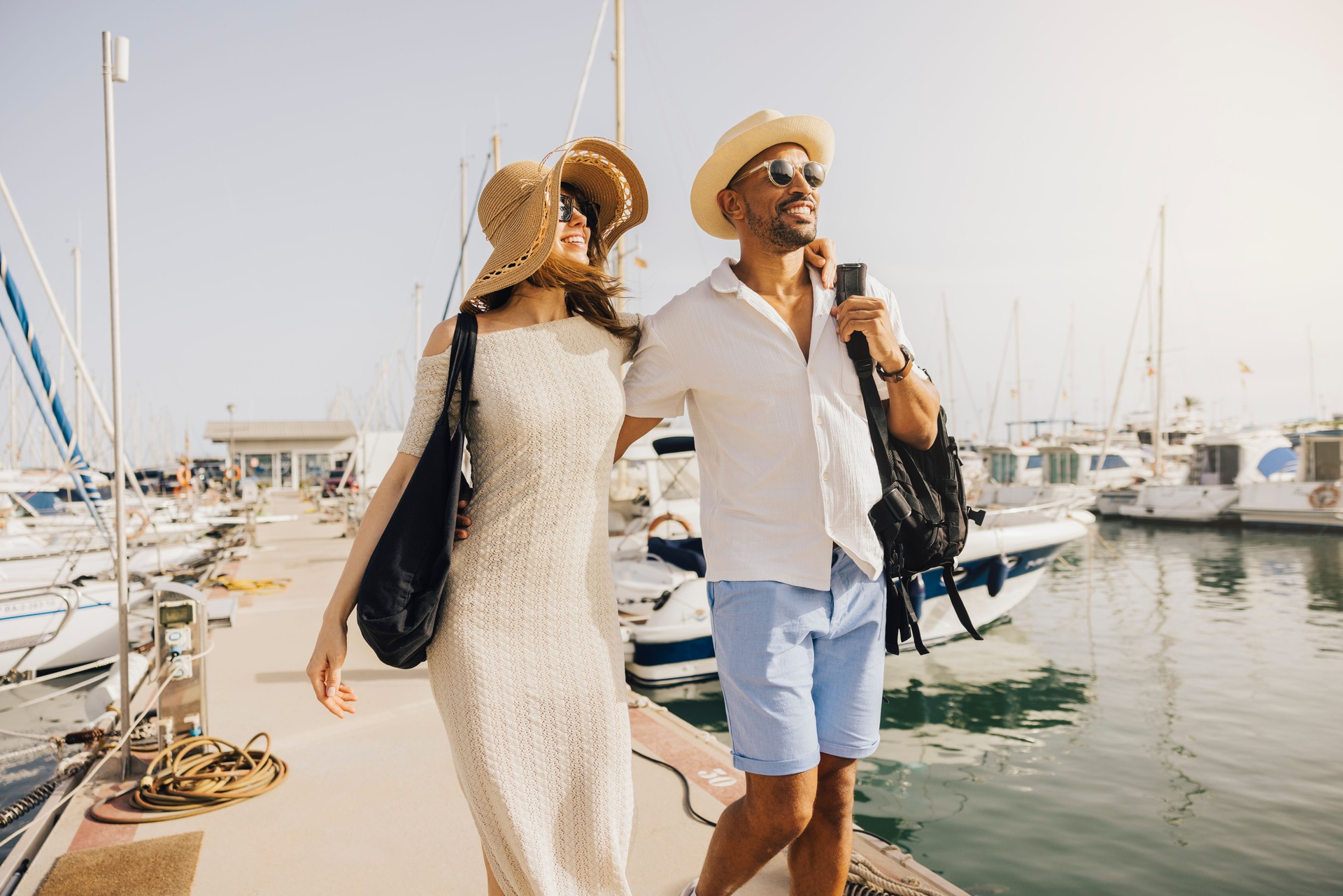 Couple enjoying a sunny day at the marina